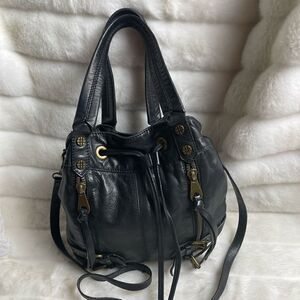 Joelle Hawkens soft leather black bucket style satchel with drawstring
